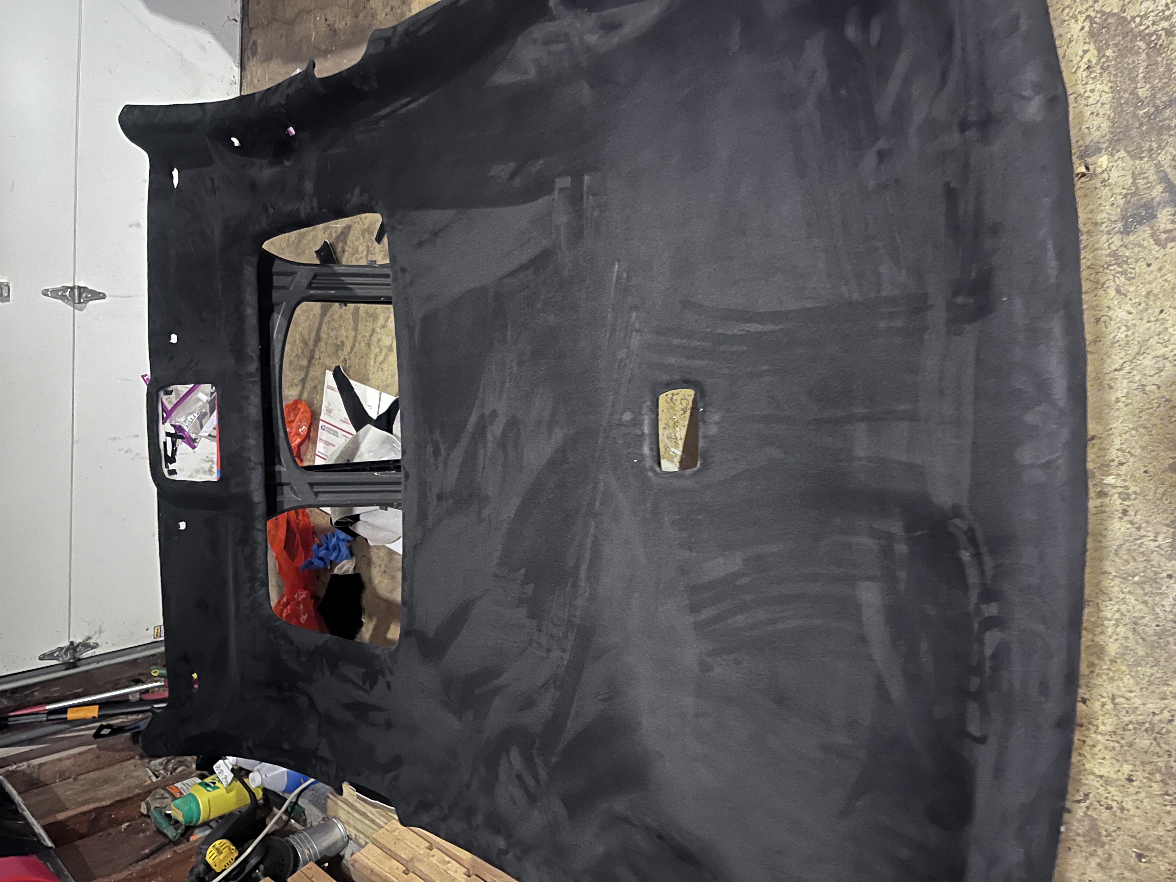 Side-by-side of raw board prep, halfway sprayed, and full suede wrap